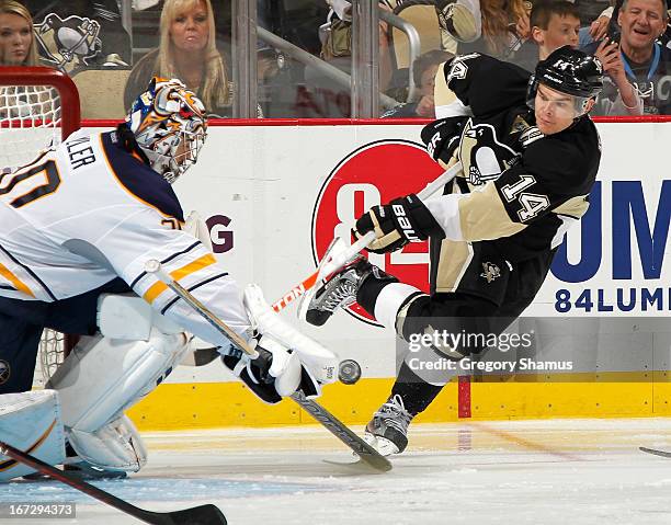 Ryan Miller of the Buffalo Sabres blocks a shot by Chris Kunitz of the Pittsburgh Penguins on April 23, 2013 at Consol Energy Center in Pittsburgh,...