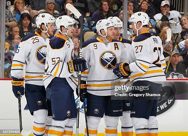 Steve Ott of the Buffalo Sabres talks with Adam Pardy, Mark Pysyk and Mikhail Grigorenko during the third period against the Pittsburgh Penguins on...