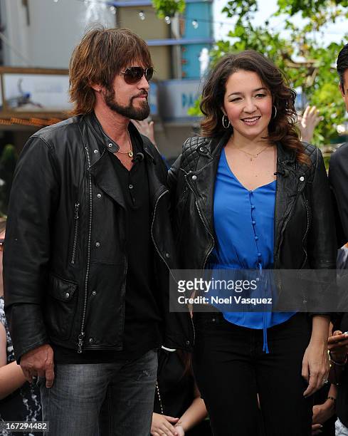 Billy Ray Cyrus and Sara Mann visit "Extra" at The Grove on April 23, 2013 in Los Angeles, California.