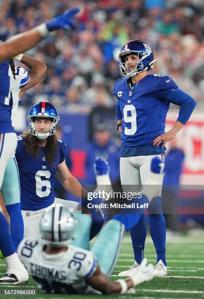 Graham Gano of the New York Giants reacts after a missed field goal during the second quarter against the Dallas Cowboys at MetLife Stadium on...