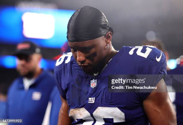 Saquon Barkley of the New York Giants reacts on the sideline during the second quarter against the Dallas Cowboys at MetLife Stadium on September 10,...