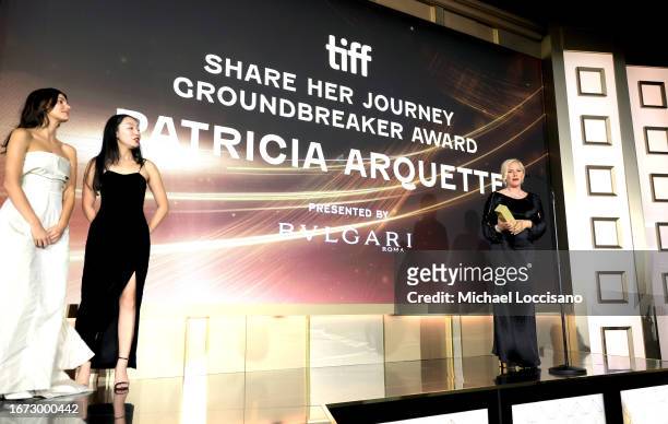 Honoree Patricia Arquette accepts the Share Her Journey Groundbreaker Award from Camila Morrone onstage at the TIFF Tribute Gala during the 2023...