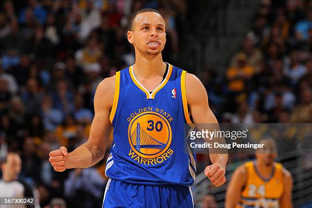 Stephen Curry of the Golden State Warriors celebrates a play against the Denver Nuggets during Game Two of the Western Conference Quarterfinals of...