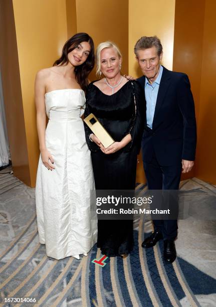 Camila Morrone, honoree Patricia Arquette, recipient of the Share Her Journey Groundbreaker Award, and Willem Dafoe attend the TIFF Tribute Gala...