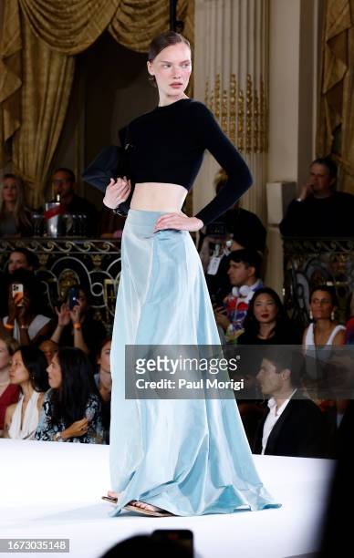 Model walks the runway at the Staud fashion show during New York Fashion Week at The Plaza Hotel on September 10, 2023 in New York City.