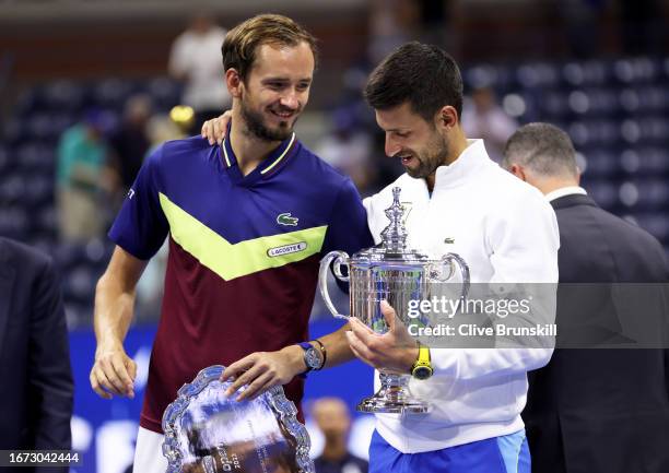 Novak Djokovic of Serbia with his winners trophy after defeating Daniil Medvedev of Russia during their Men's Singles Final match on Day Fourteen of...