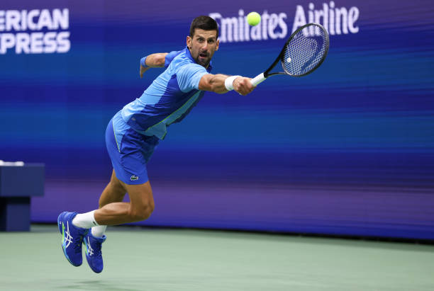Novak Djokovic of Serbia plays a backhand against Daniil Medvedev of Russia during their Men's Singles Final match on Day Fourteen of the 2023 US...