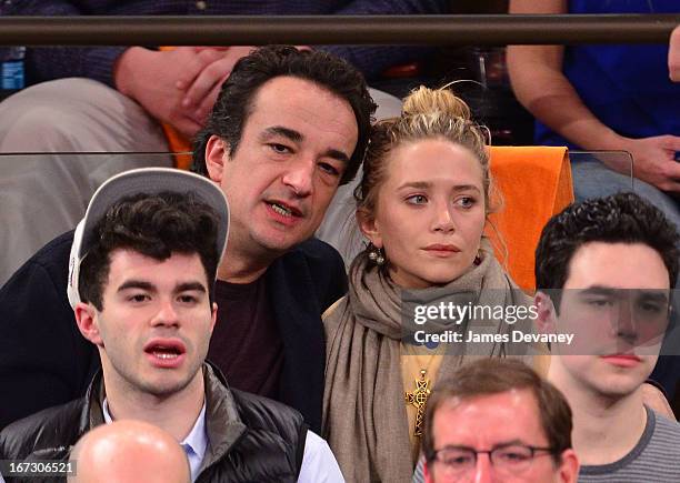 Olivier Sarkozy and Mary-Kate Olsen attend the Boston Celtics vs New York Knicks Playoff Game at Madison Square Garden on April 23, 2013 in New York...