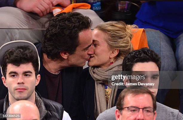 Olivier Sarkozy and Mary-Kate Olsen attend the Boston Celtics vs New York Knicks Playoff Game at Madison Square Garden on April 23, 2013 in New York...