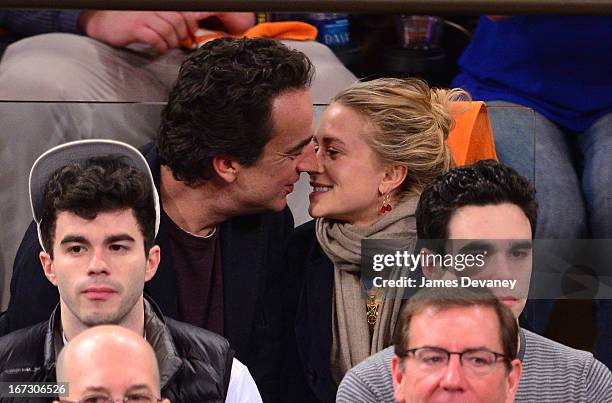 Olivier Sarkozy and Mary-Kate Olsen attend the Boston Celtics vs New York Knicks Playoff Game at Madison Square Garden on April 23, 2013 in New York...