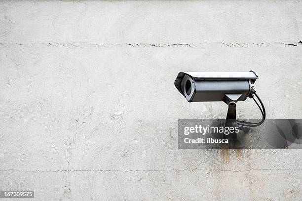 surveillance camera with wall - bewakingscamera stockfoto's en -beelden