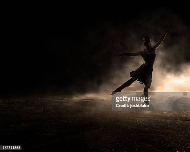 dancing in the dark - contemporary dance stock-fotos und bilder