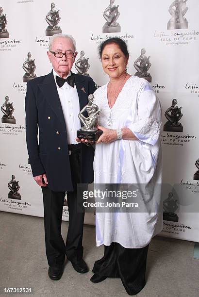 Jose Angel Espinoza and Angelica Aragon pose backstage at the Latin Songwriters Hall of Fame Gala at New World Center on April 23, 2013 in Miami...