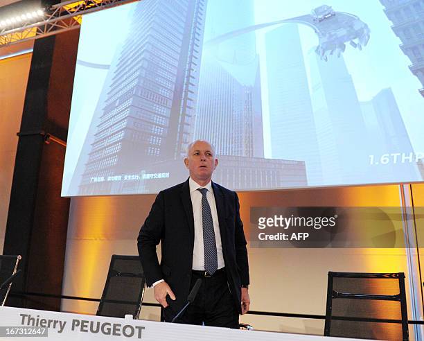French carmaker PSA Peugeot Citroen Chairman of the Supervisory Board Thierry Peugeot arrives at the group's shareholders general meeting at PSA...