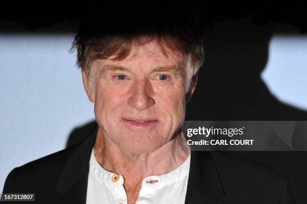 Actor Robert Redford, president and founder of the Sundance Institute, poses for pictures during opening of the Sundance London Film and Music...