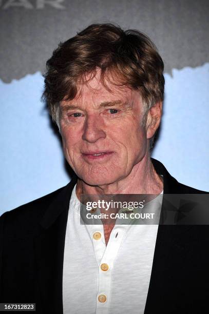 Actor Robert Redford, president and founder of the Sundance Institute, poses for pictures during opening of the Sundance London Film and Music...