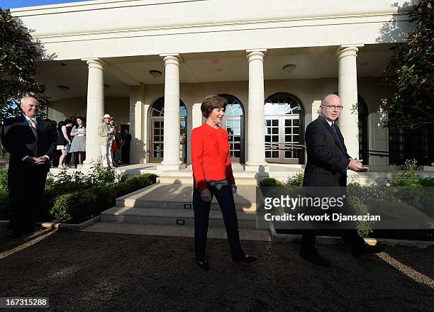 Former first lady Laura Bush and Alan Lowe, director of the George W. Bush Presidential Library, arrive for a media availabilty during a tour of the...