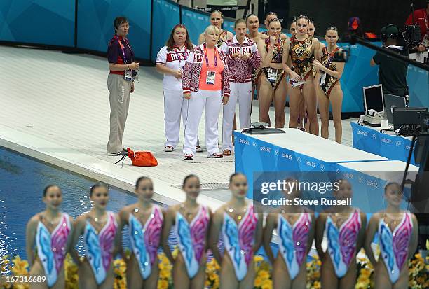 Team Russia awaits China's score in the Team Synchronized Swimming final, China would finish second to Russia at the London 2012 Olympic Games at the...