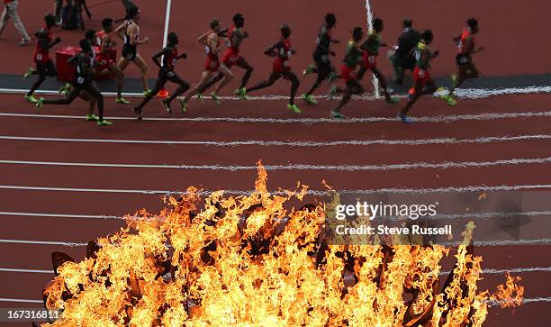 Canadian distance runner Cameron Levins, fifth from left, runs the 5,000 at the London 2012 Olympic Games at the Olympic Stadium in London.