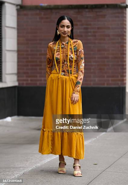 Malvika Sheth is seen wearing a Ulla Johnson top, Kristinit dress and Bottega Veneta shoes during NYFW S/S 2024 on September 10, 2023 in New York...