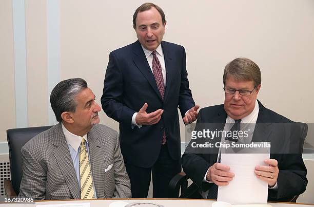 Washington Capitals majority owner Ted Leonsis, NHL Commissioner Gary Bettman and Hockey USA Executive Director Dave Ogrean participate in a briefing...