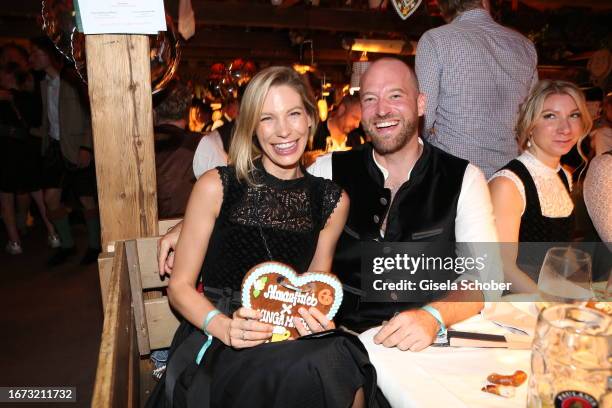 Sarah Brandner and Christian Hymer during the 25th Almauftrieb during the 188th Oktoberfest at Kaeferzelt on September 17 2023 in Munich, Germany.