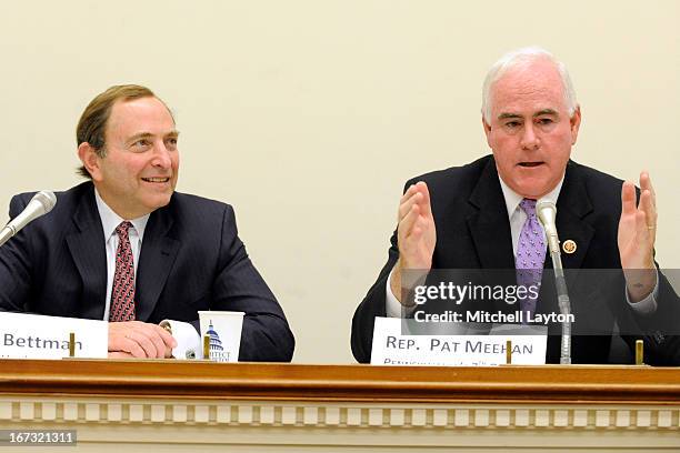 Commissioner Gary Bettman listens to Rep. Pat Meehan during a Congressional Hockey Caucus briefing at the Rayburn Building on April 24, 2013 at...