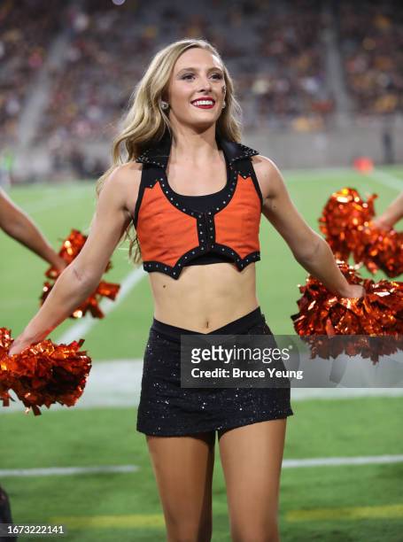 An Oklahoma State Cowboy Spirit Squad member performs during the Arizona State Sun Devils vs Oklahoma State Cowboys football game at Mountain America...