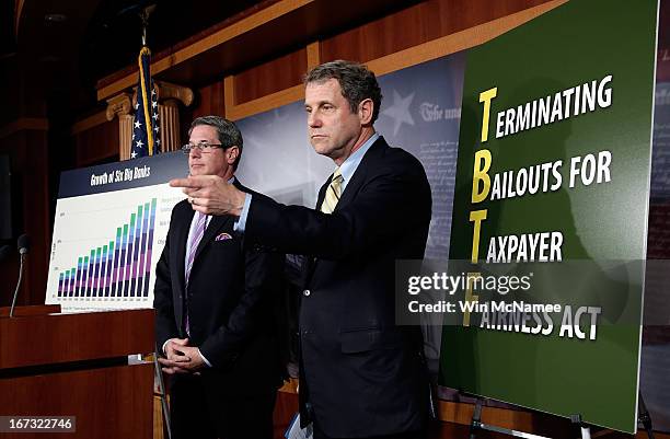 Sen. David Vitter and Sen. Sherrod Brown speak during a press conference announcing the details of "Too Big to Fail" legislation at the U.S. Capitol...