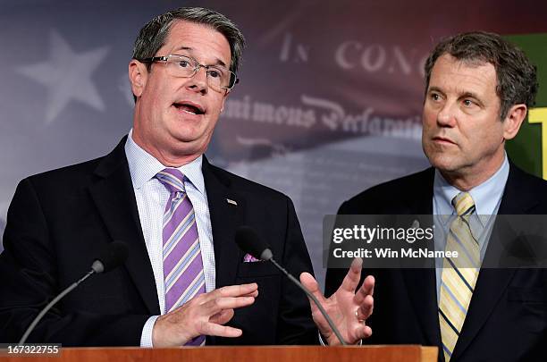 Sen. David Vitter and Sen. Sherrod Brown speak during a press conference announcing the details of "Too Big to Fail" legislation at the U.S. Capitol...