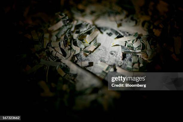 Shredded currency surrounds a U.S. One dollar bill in Washington, D.C., U.S., on Wednesday, April 24, 2013. The S&P 500 has surged 134 percent from a...