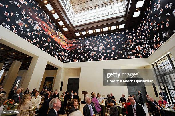 Ceremony participants look at the 360-degree LED high definition video wall inside the Freedom Hall during signing ceremony for the joint use...