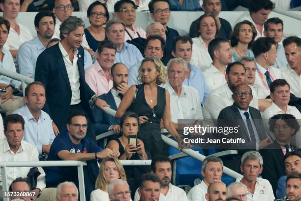 Caroline Roux and Laurent Solly, Guy Drut, Philippe Diallo attend the Rugby World Cup France 2023 match between France and New Zealand at Stade de...