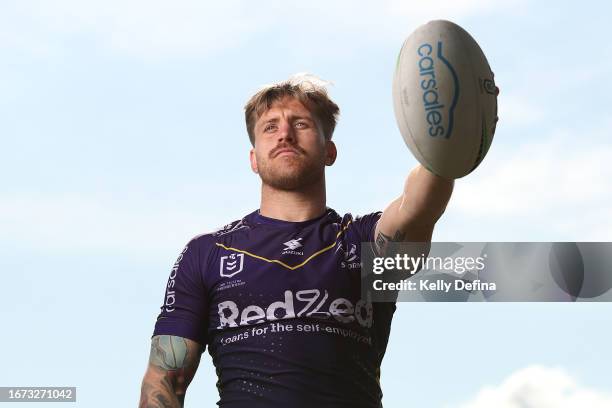 Cameron Munster of the Storm poses for a portrait during a Melbourne Storm NRL media opportunity at AAMI Park on September 11, 2023 in Melbourne,...
