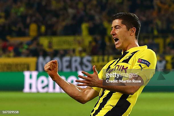 Robert Lewandowski of Borussia Dortmund celebrates scoring the opening goal during the UEFA Champions League semi final first leg match between...