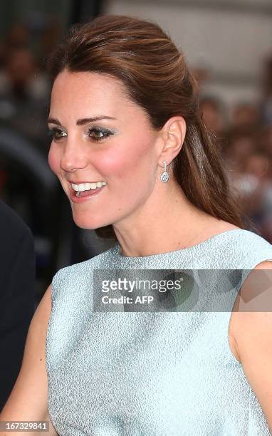 Britain's Catherine, Duchess of Cambridge arrives to attend an evening reception to celebrate the work of The Art Room charity at The National...