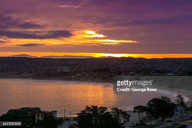 The Monterey Bay is viewed at sunrise on April 6 in Monterey, California. Some 13.6 million international travelers visit the State each year...