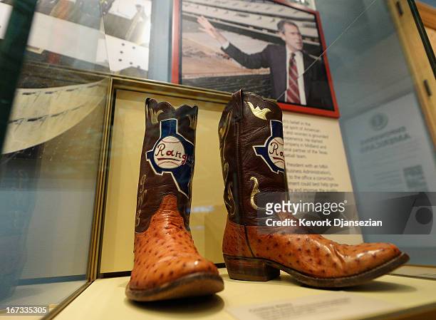 Boots commemorating George W. Bush's tenure as general managing partner of the Texas Rangers are displayed at the George W. Bush Presidential Center...