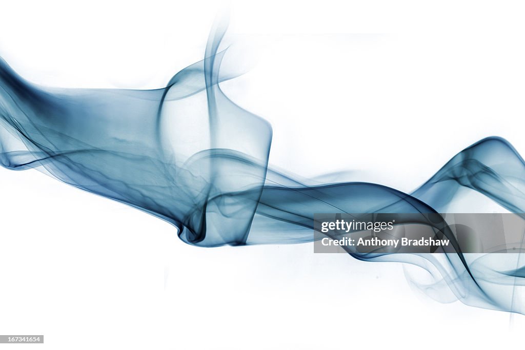 Twisting swathe of blue smoke