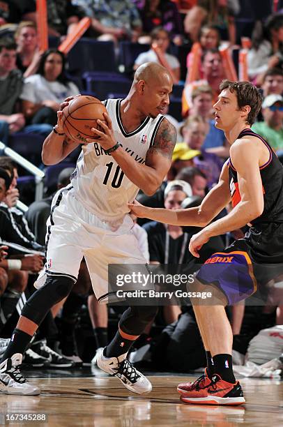 Keith Bogans of the Brooklyn Nets looks to pass the ball against the Phoenix Suns on March 24, 2013 at U.S. Airways Center in Phoenix, Arizona. NOTE...