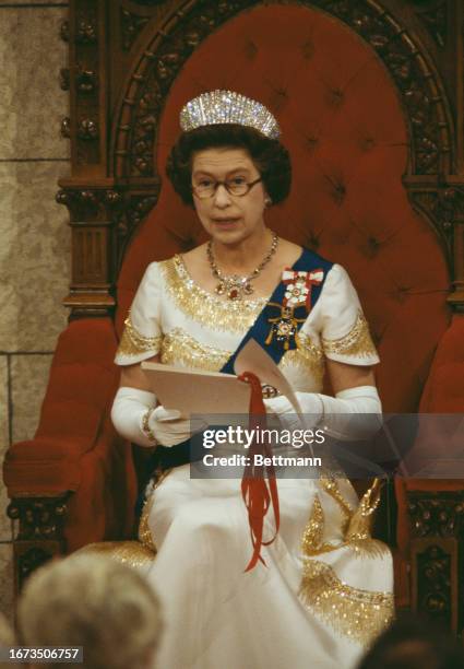 Queen Elizabeth reading the Throne Speech in the Senate Chamber of the Canadian Parliament during the Queen's Silver Jubilee Tour, Ottawa, October...