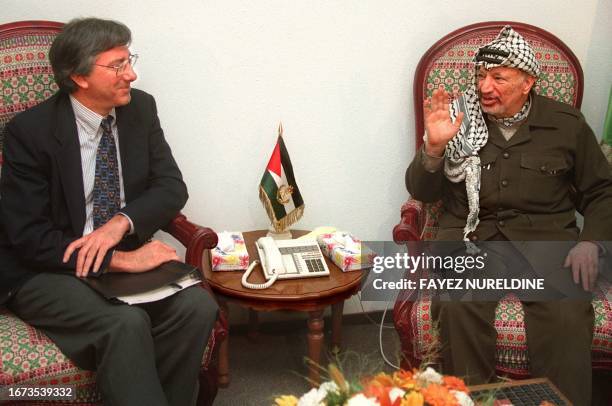 Palestinian Authority President Yasser Arafat gestures during his talks with US special envoy Dennis Ross in Gaza City 26 April. Ross met Arafat in a...