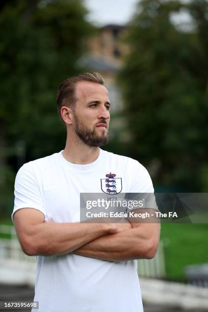 Harry Kane of England poses for a photo wearing a unique warm-up shirt ahead of the 150th Anniversary Heritage Match against Scotland at Hampden...