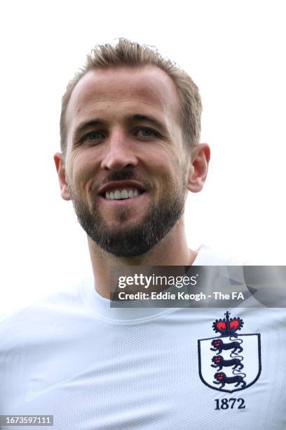 Harry Kane of England poses for a photo wearing a unique warm-up shirt ahead of the 150th Anniversary Heritage Match against Scotland at Hampden...