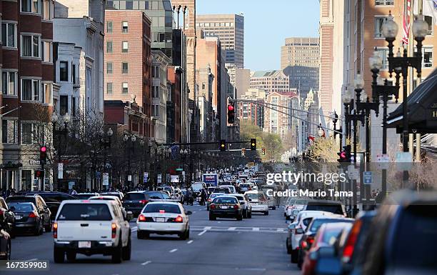 Cars drive on Boylston Street near the site of the Boston Marathon bombings on April 24, 2013 in Boston, Massachusetts. Boylston Street, the site of...