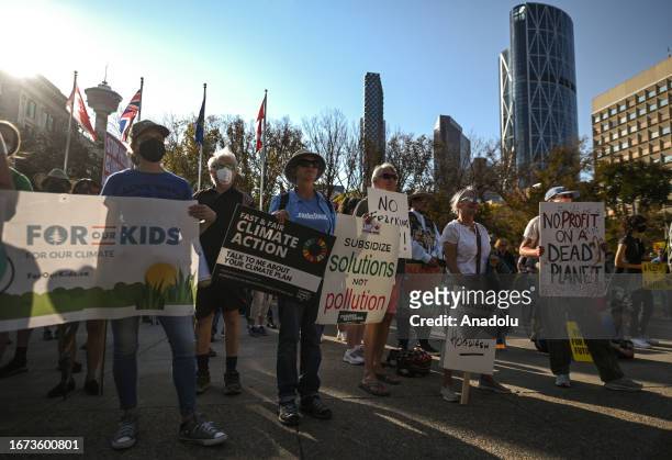 Activists gather during the 'Rally for Climate Sanity' at the Calgary's Town Hall in opposition to the 24th World Petroleum Congress Opening Ceremony...