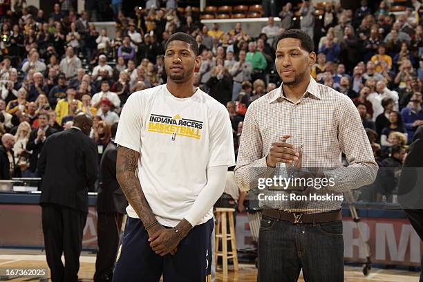 Paul George of the Indiana Pacers prepares to receive his KIA NBA Most Improved Player award from teammate Danny Granger of the Indiana Pacers during...