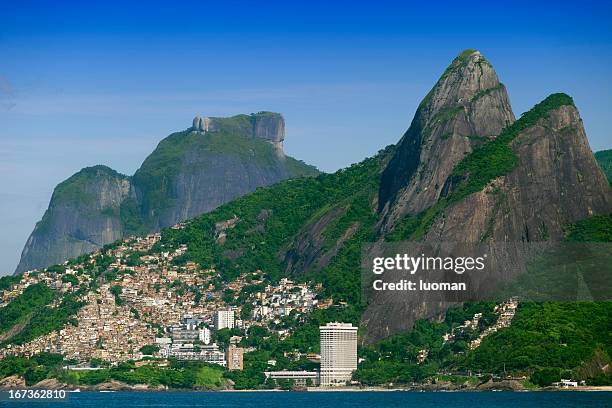 two brothers and pedra da gavea - rio de janeiro favela stock pictures, royalty-free photos & images