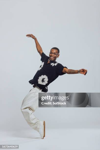 confident young male breakdancing - stubble stock pictures, royalty-free photos & images