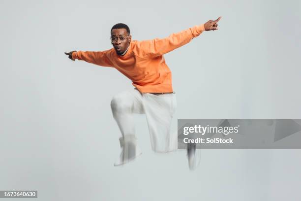 energetic jumping action - leap stock pictures, royalty-free photos & images